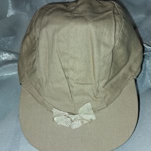 Vintage ladies beige cap size 7 1/8. Looks like a 40s style but still popular.